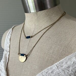 Silver tone double layer necklace with blue accent